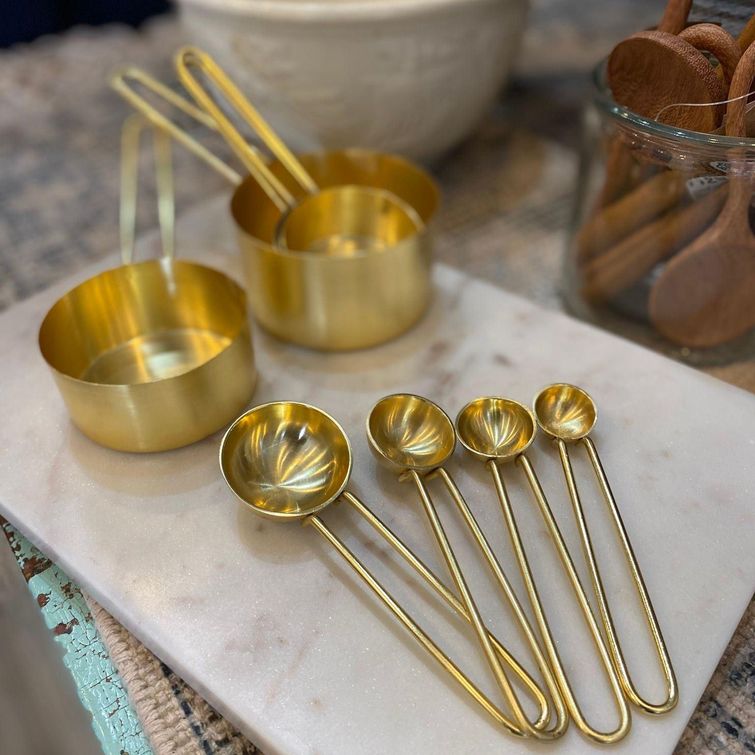Golden kitchen utensils during golden hour