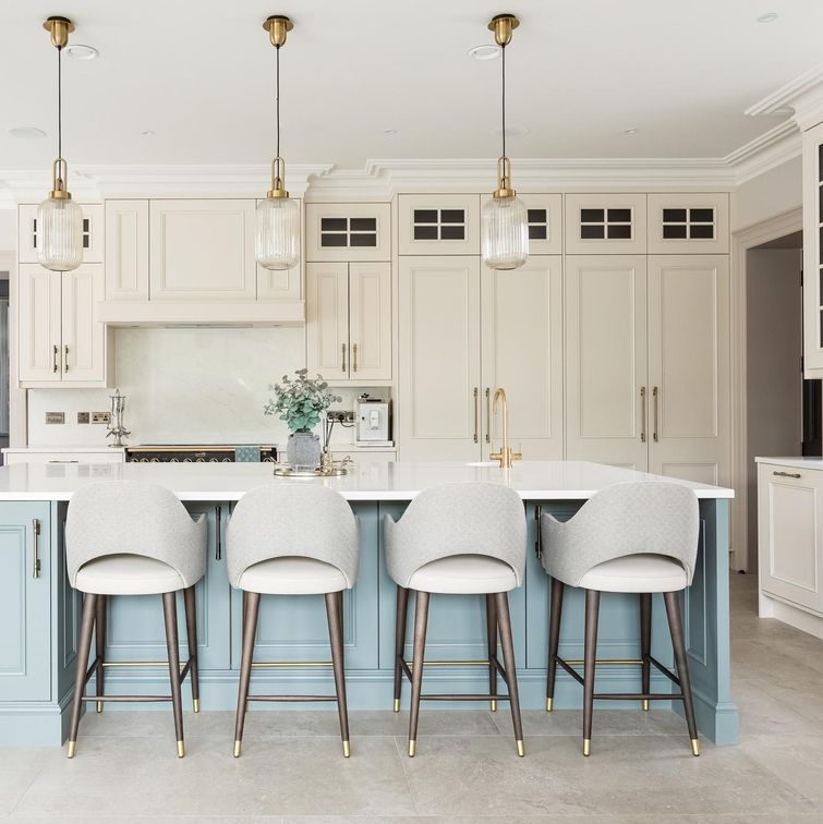 Luxurious classic style kitchen with blue lower cabinets