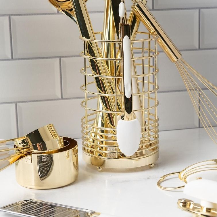 Gold kitchen utensils with summer theme