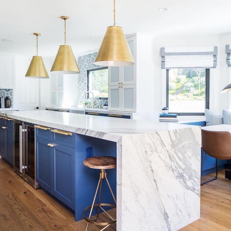 Blue accented kitchen by Benedict August