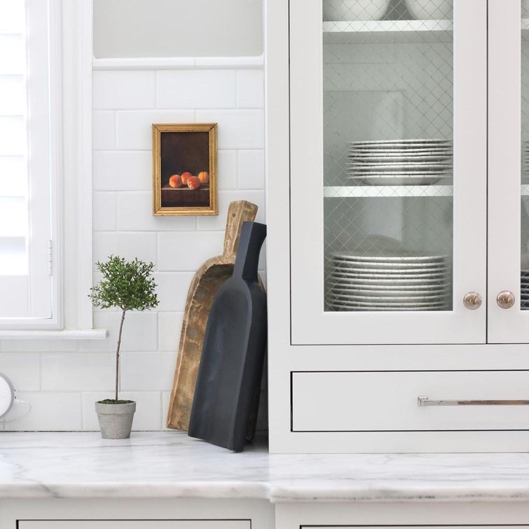 Antique items on kitchen countertop