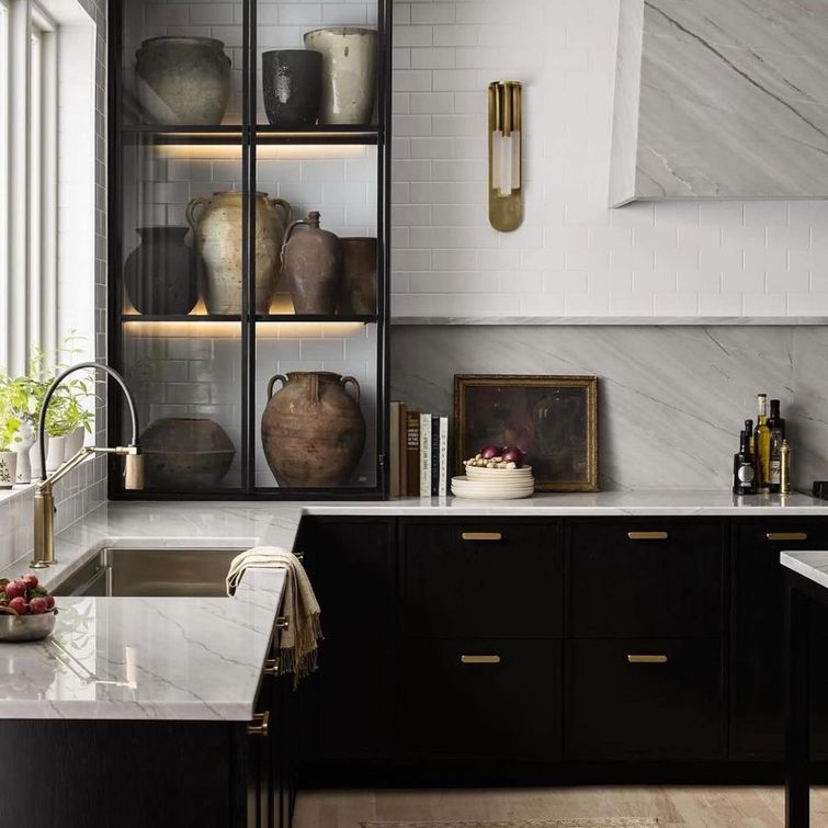 Open upper cabinets with bold backsplash