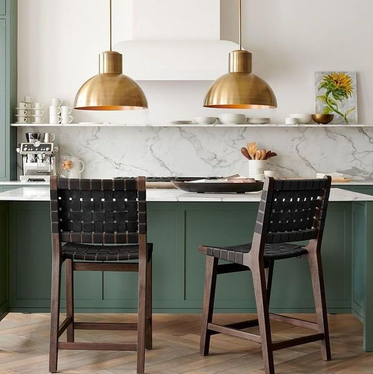 Kitchen with updated lighting and stools