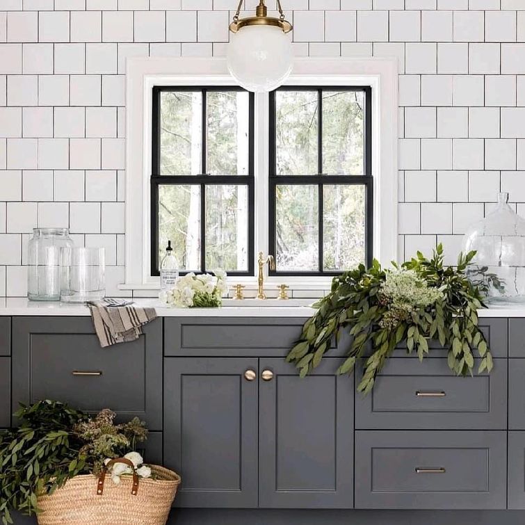 Carriage house kitchen with square tile backsplash